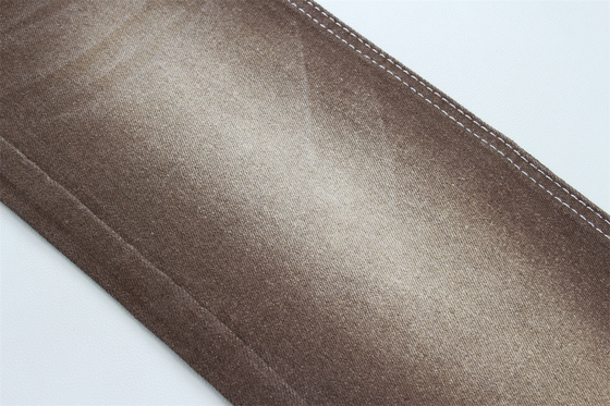ผ้าเดนม Super Brown Stretch สําหรับผู้หญิง ชายกางเกงยีนส์ยืดต่ํา ราคาที่แข่งขัน จากประเทศจีน โฟชาน ซิตี้