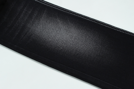13.5oz สีดํามืดมาก เนื้อเพลิงเนื้อเพลิงเข้มงวด 100% ผ้าปูนยางยางรีไซเคิลสําหรับคนทํางาน Jean Cloth ดํา ดําด้านหลัง