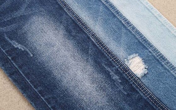 คุณภาพสูง 14.5 oz 100% ผ้ายีนส์ผ้ายางเขียว ยีนส์หนักคลาสสิกสําหรับเสื้อกางเกง