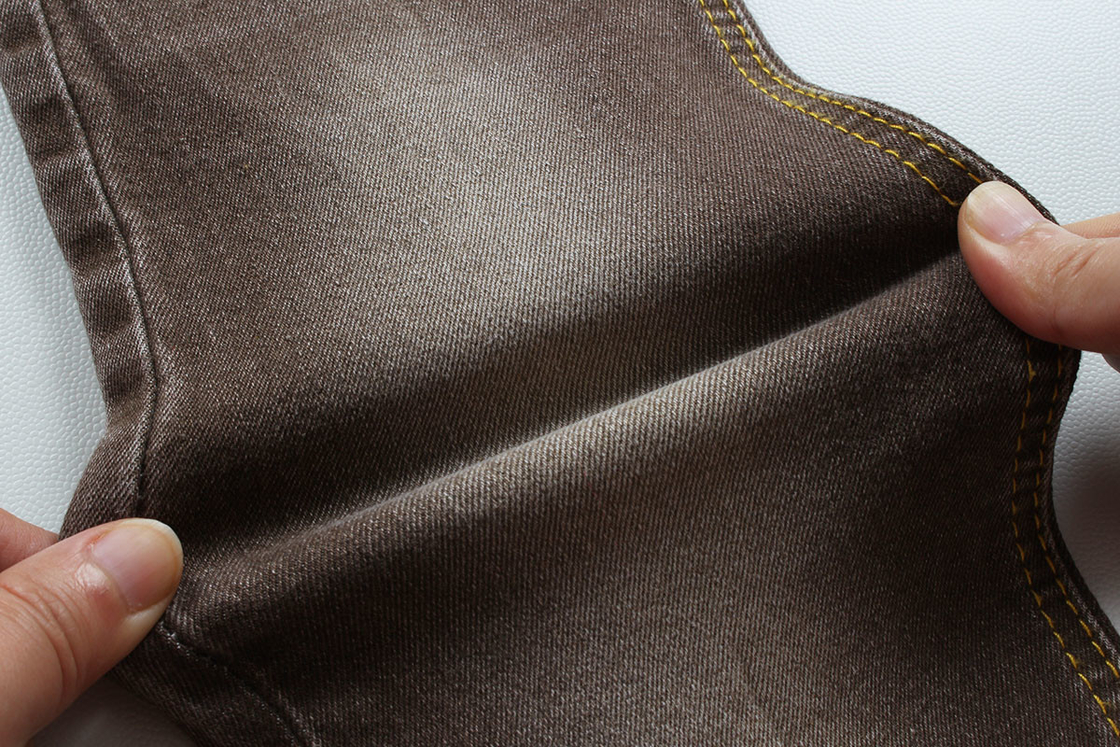 ผ้าเดนม Super Brown Stretch สําหรับผู้หญิง ชายกางเกงยีนส์ยืดต่ํา ราคาที่แข่งขัน จากประเทศจีน โฟชาน ซิตี้